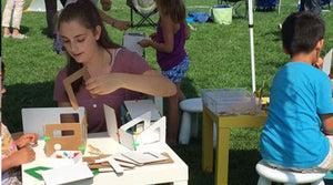 mentoring children in STEM with cardboard modeling